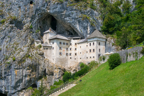 Scenic view of Predjama castle near Postojna, Slovenia at sunny summer day