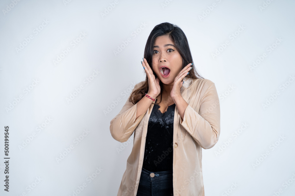 Young woman shoked with both palms gesture side a copyspace on isolated background Young woman shoked with both palms gesture side a copyspace on isolated background