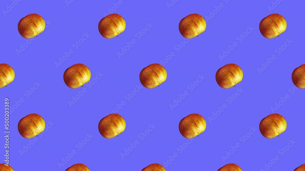 Minimal motion design - red apples rotating and moving down at violet color background. Trendy colors and style graphics. Seamless looping animation. Minimal motion design - red apples rotating and moving down at violet color background. Trendy colors and style graphics. Seamless looping animation.