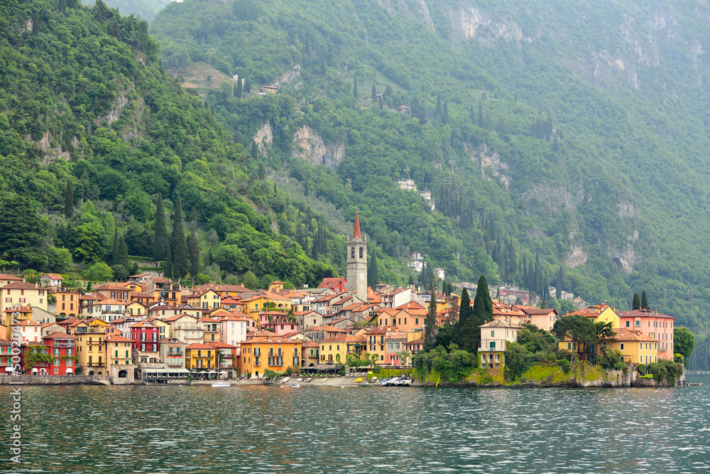 city with a tower on the shores of Lake Como