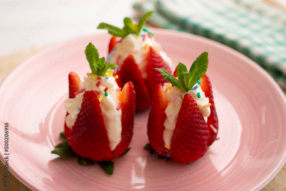 Strawberries stuffed with cream. Traditional Barcelona dessert. Strawberries stuffed with cream. Traditional Barcelona dessert.
