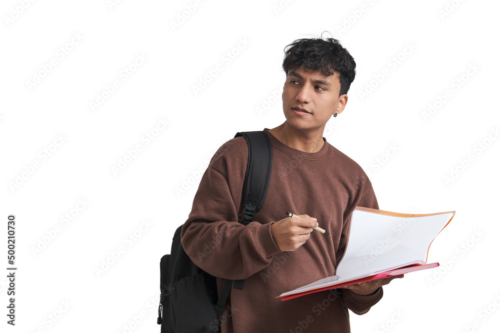 Young peruvian student looking at a side holding pen and folder, isolated.