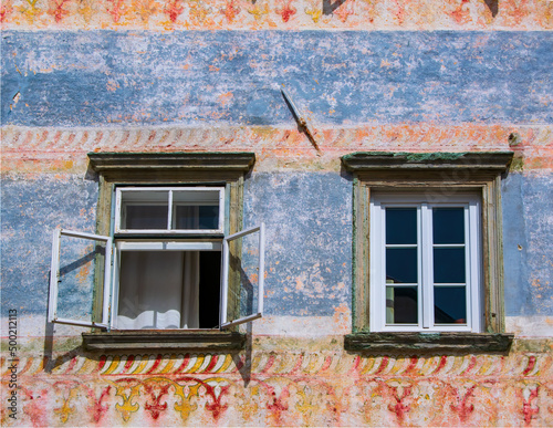 Two window on historical Vidiceva Hisa in the center of Radovljica town, Slovenia photo