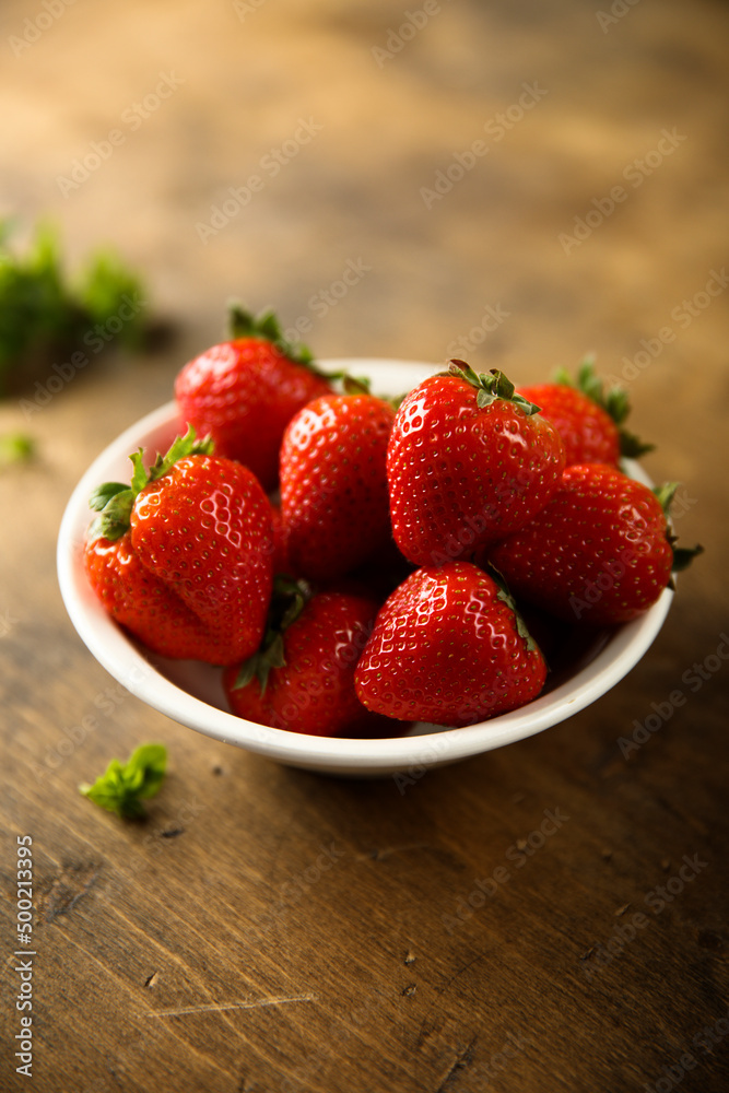 Fresh ripe strawberry in a white bowl Fresh ripe strawberry in a white bowl