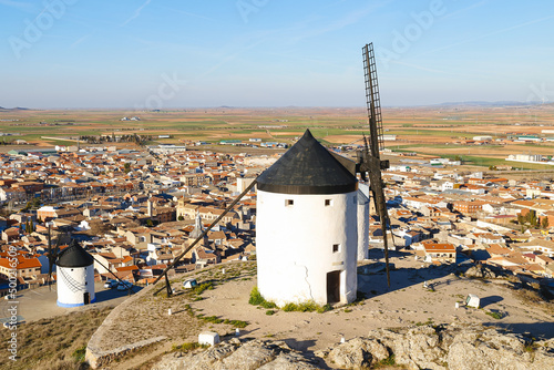 view of Group of old windmills in the city of Consuegra (Spain), on the route of the Don Quixote and Cervantes mills