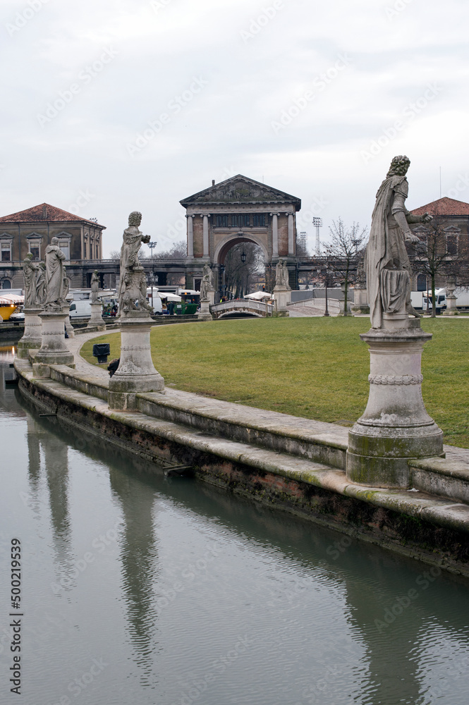 Part of the park with the canal and its 78 statues and ex Forum Boarium in the Prato della Valle square, Padua, Italy.