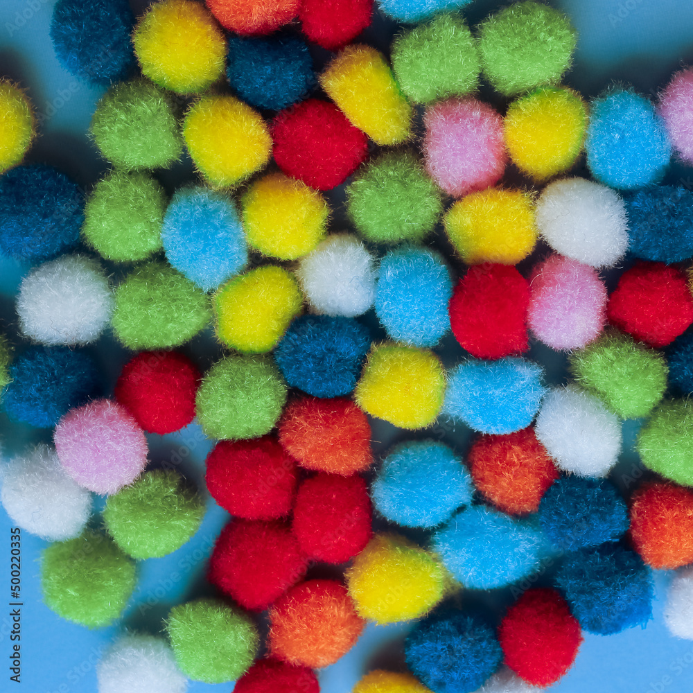 Colorful pom-poms background, texture pom-poms macro Colorful pom-poms background, texture pom-poms macro