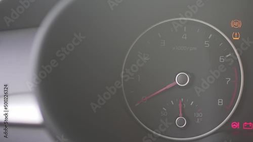 Close-up of the car tachometer. Auto starts. Control of indicators on the scoreboard. Indicators and arrows in the panel 4K 10 BIT