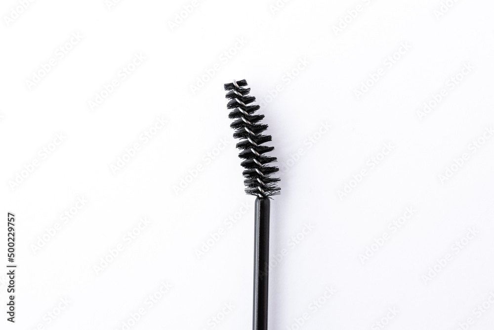 black eyelash brush isolated on white background close-up macro black eyelash brush isolated on white background close-up macro