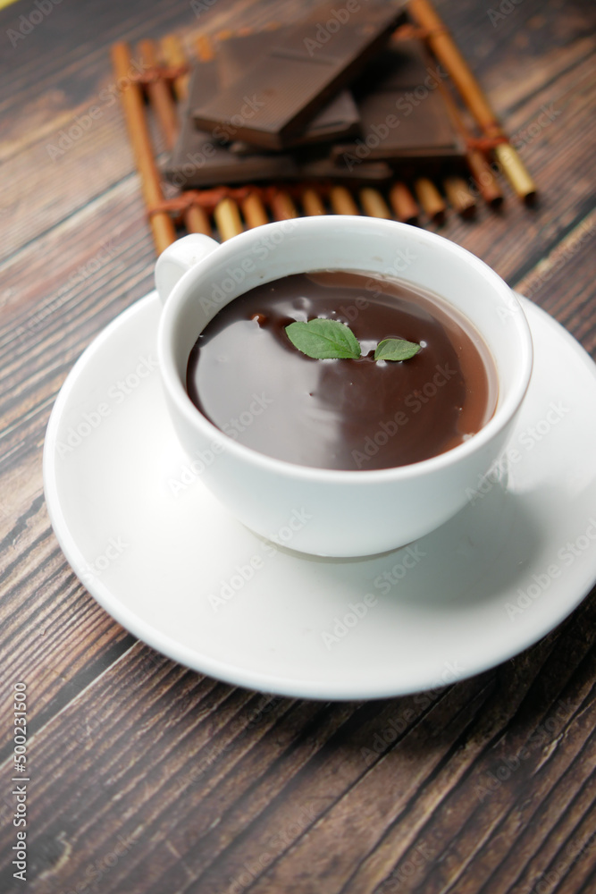 dark chocolate cream in a coffee cup on table dark chocolate cream in a coffee cup on table
