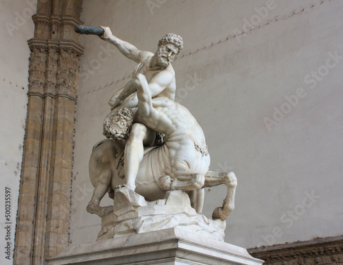 Statue of Hercules killing the Centaur, by Giambologna. Located in the open-air gallery (Loggia dei Lanzi) on the Piazza della Signoria in Florence, Italy photo