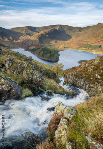 A view down a picturesque waterfall to Rannerdale in the Lake District  a scenic area of beauty