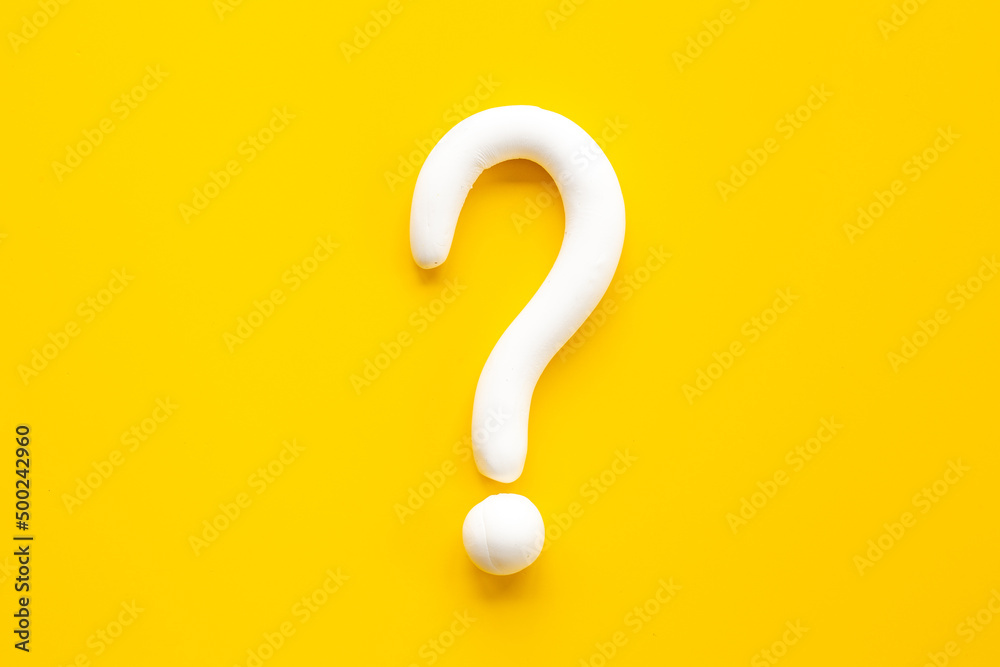 Question mark sign made of plasticine. FAQ and help concept Question mark sign made of plasticine. FAQ and help concept