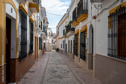Fototapeta Naklejka Na Ścianę i Meble -  Travel destination, small Andalusian town Nerja with white houses and narrow streets on Costa del Sol, Spain