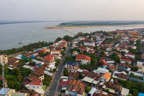 Bild auf Leinwand Panoramic drone view of cityscape near Mekong River in Kampong Cham, Cambodia