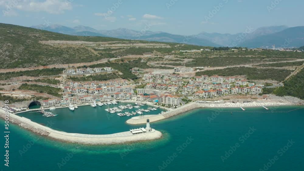 Modern tourist residential area Lustica Bay with luxury real estate near the Adriatic Sea in Montenegro Modern tourist residential area Lustica Bay with luxury real estate near the Adriatic Sea in Montenegro