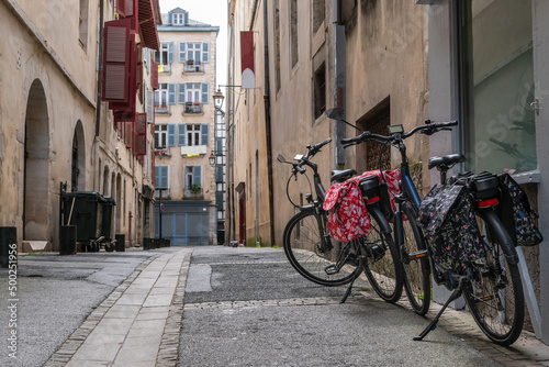 Bicycles with panniers in the old town of Baiona. French Basque Country © Néstor MN