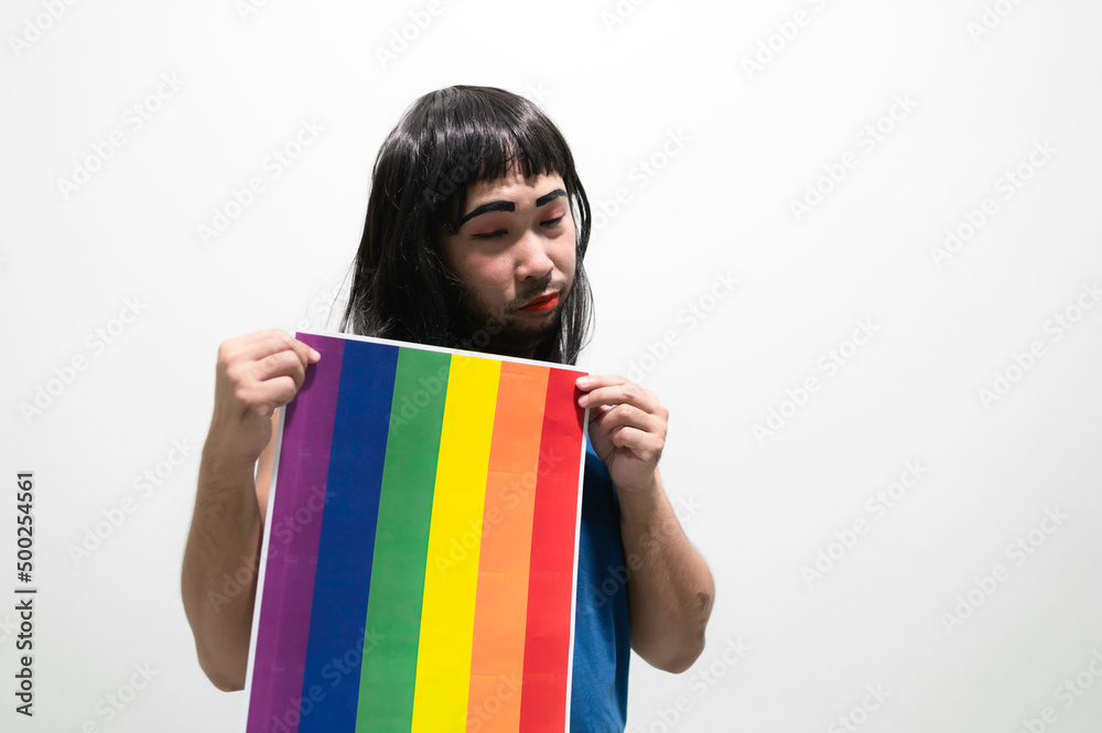 LGBT Pride month concept,Asian Handsome male make up and wear woman cloth,Gay Freedom Day,Portrait of Non-binary on white background LGBT Pride month concept,Asian Handsome male make up and wear woman cloth,Gay Freedom Day,Portrait of Non-binary on white background