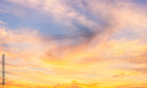 Sunset sky in the morning with yellow sunrise clouds with golden hour 