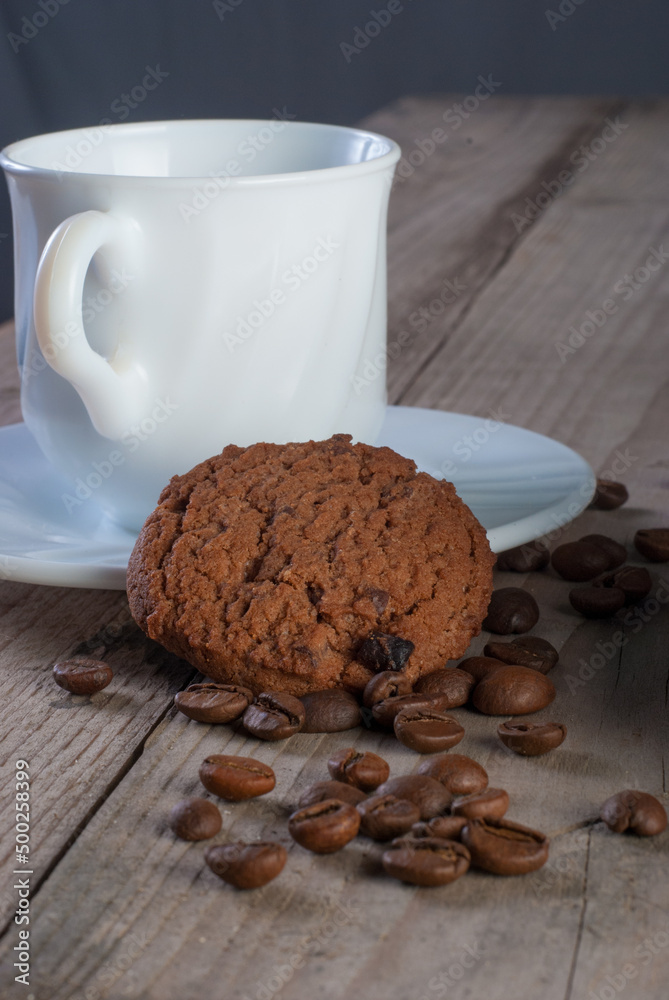 Fototapeta premium Fresh coffee with biscuits and roasted beans