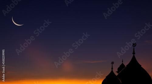 Fotografiet Mosques dome and crescent moon on dusk sky religion of Islamic and free space fo