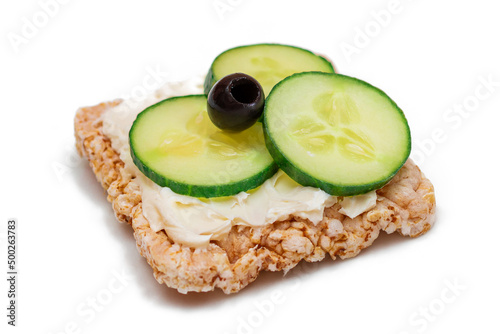 Rice Cake Sandwich with Fresh Cucumber, Cream Cheese and Olives - Isolated on White. Easy Breakfast. Quick and Healthy Sandwiches. Crispbread with Tasty Filling. Healthy Dietary Snack - Isolation