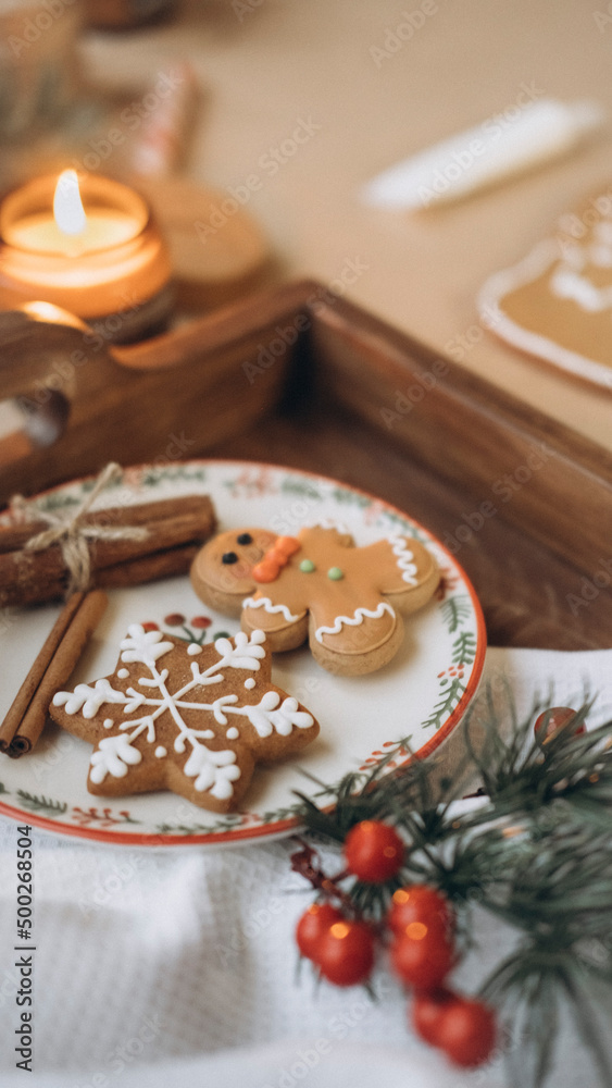 Christmas cookies on a plate with Christmas decorations