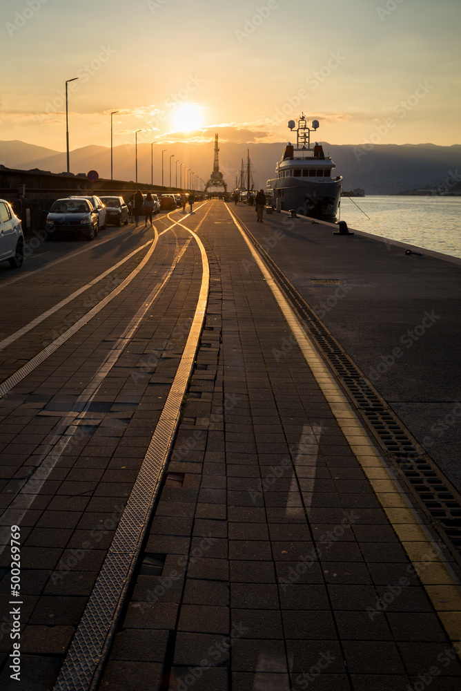  Rijeka/Croatia: Containers cargo illuminated cranes at night in the Kontejnerski terminal Brajdica in Rijeka International Port.