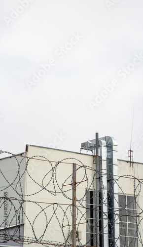 Fencing of the production area with barbed wire.