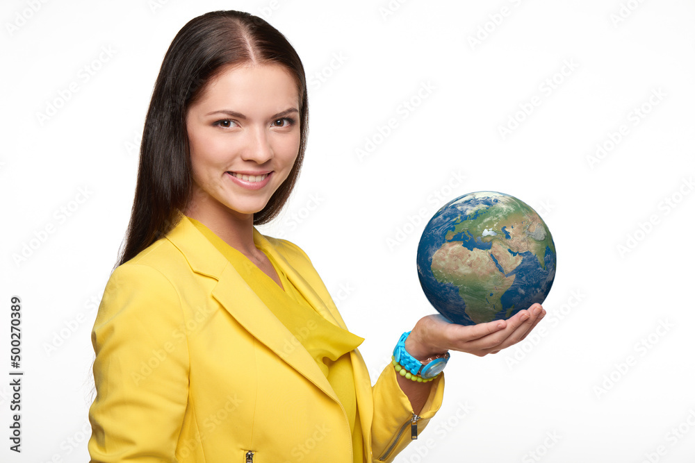 Happy smiling woman holding small earth globe on her palm Happy smiling woman holding small earth globe on her palm