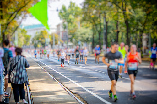 marathon runners in the city © babaroga