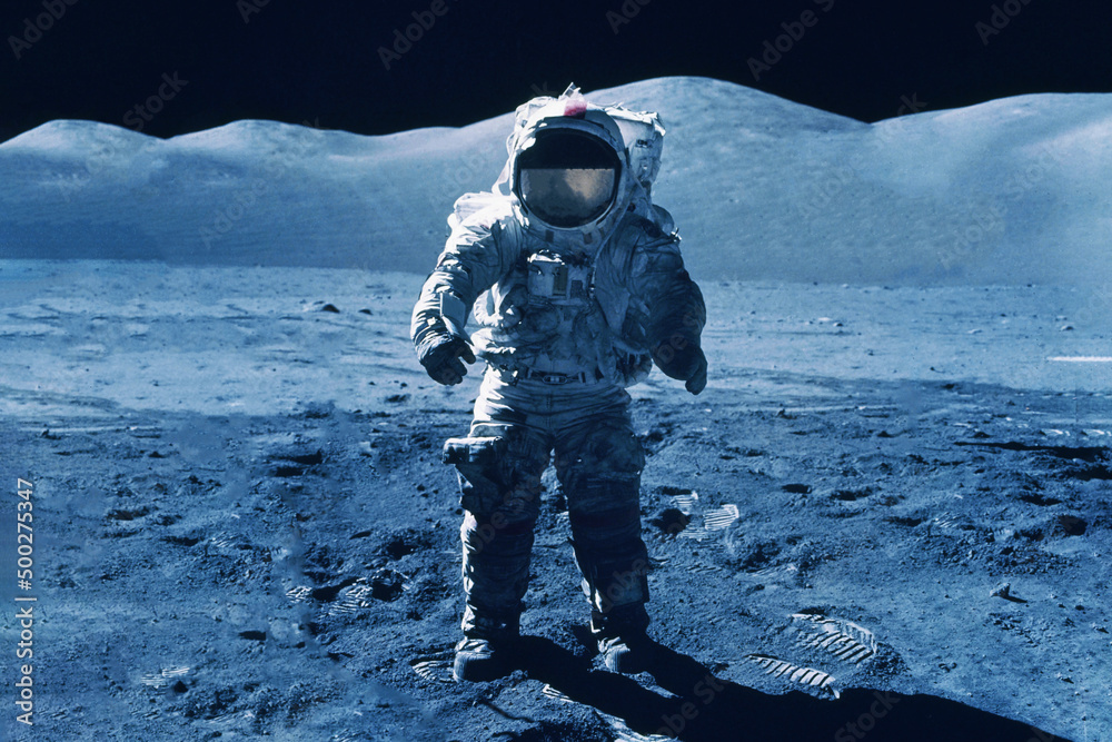 The astronaut goes across the Moon, in a white space suit Elements of this image were furnished by NASA