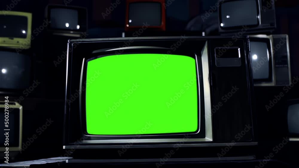 Stacked Vintage Television Green Screen. Dolly Out. You can replace green screen with the footage or picture you want. You can do it with “Keying” effect in After Effects. 4K.