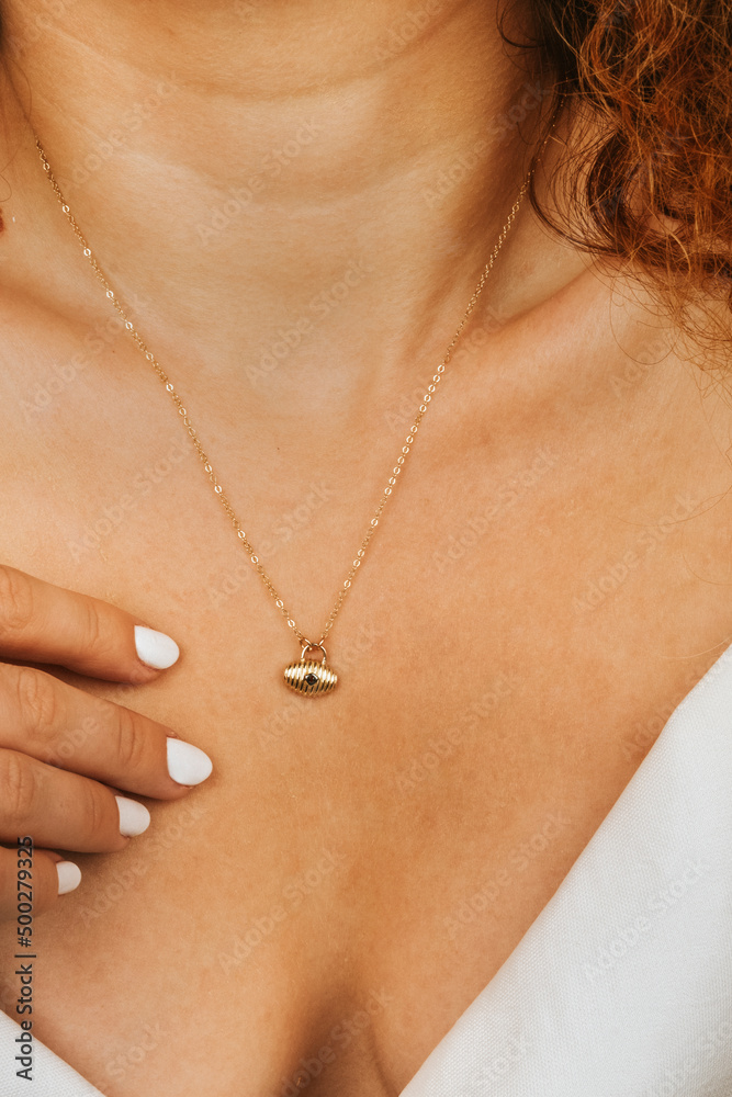 Close up necklace on necklace girl's neck. Beautiful woman wearing black jacket style with diamonds, six, diamond necklace, luxury fashion jewelry. Close up necklace on necklace girl's neck. Beautiful woman wearing black jacket style with diamonds, six, diamond necklace, luxury fashion jewelry.