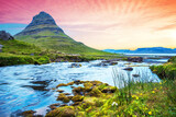 Beautiful natural magical scenery with the volcano near Kirkjufell in Iceland at dawn. Exotic countries. Amazing places. Popular tourist atraction. (Meditation, antistress - concept).