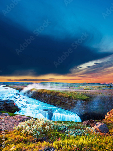 Obraz na płótnie Magical charming bright colorful landscape with a famous Gullfoss waterfall in the sunrise in Iceland. Exotic countries. Amazing places. Popular tourist atraction. (Meditation, antistress - concept). w salonie