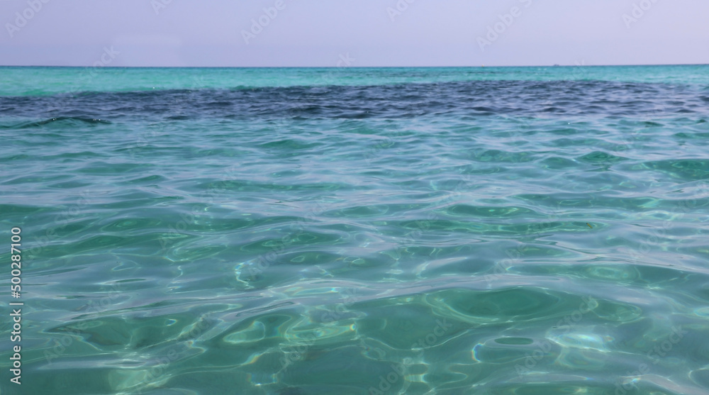 transparent clean water of the ocean without people