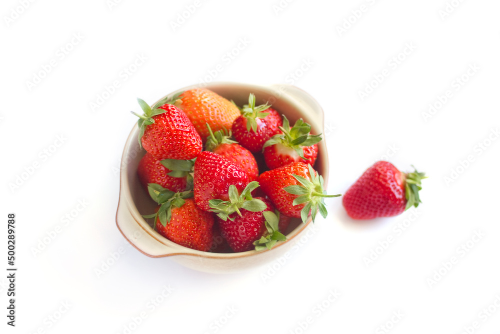 Bowl of Fresh strawberries on white Bowl of Fresh strawberries on white