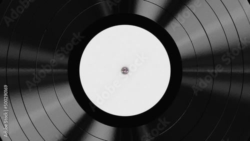 Realistic seamless looping 3D animation of the white label vinyl record rendered in UHD as motion background