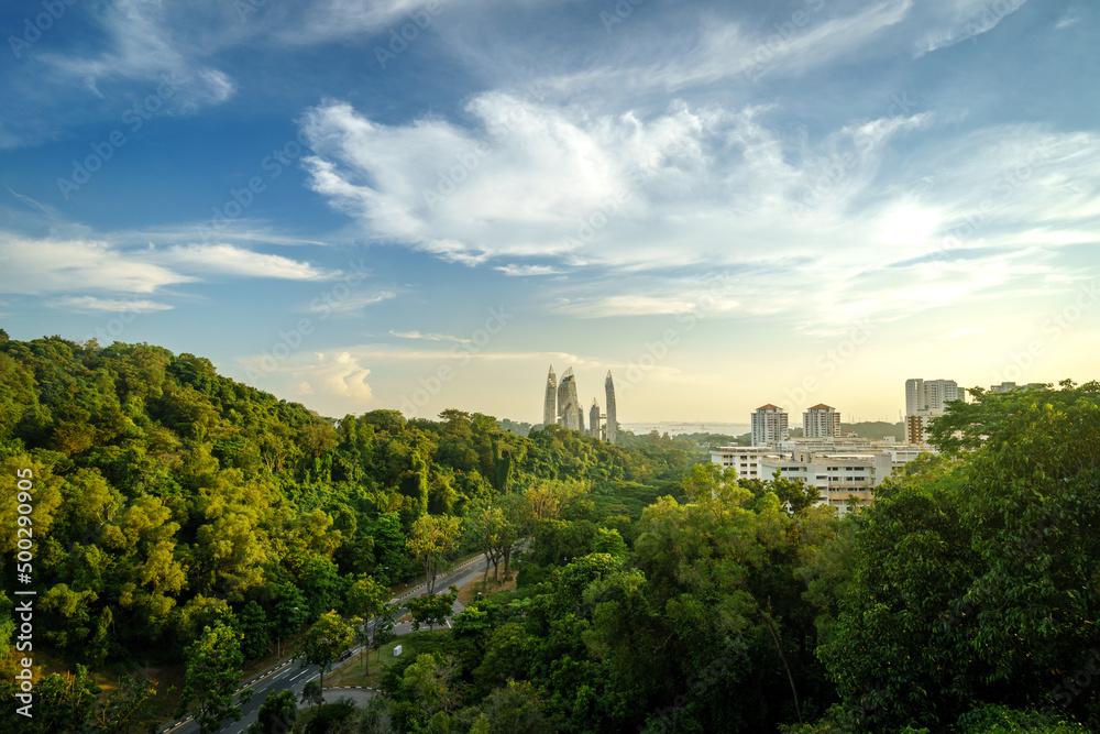 The magically forested view of Keppel Bay from Henderson Wave, Singapore. Green corridors covers the Singapore city-space and they allow the animals adapted to the urban forest to pass safely. 