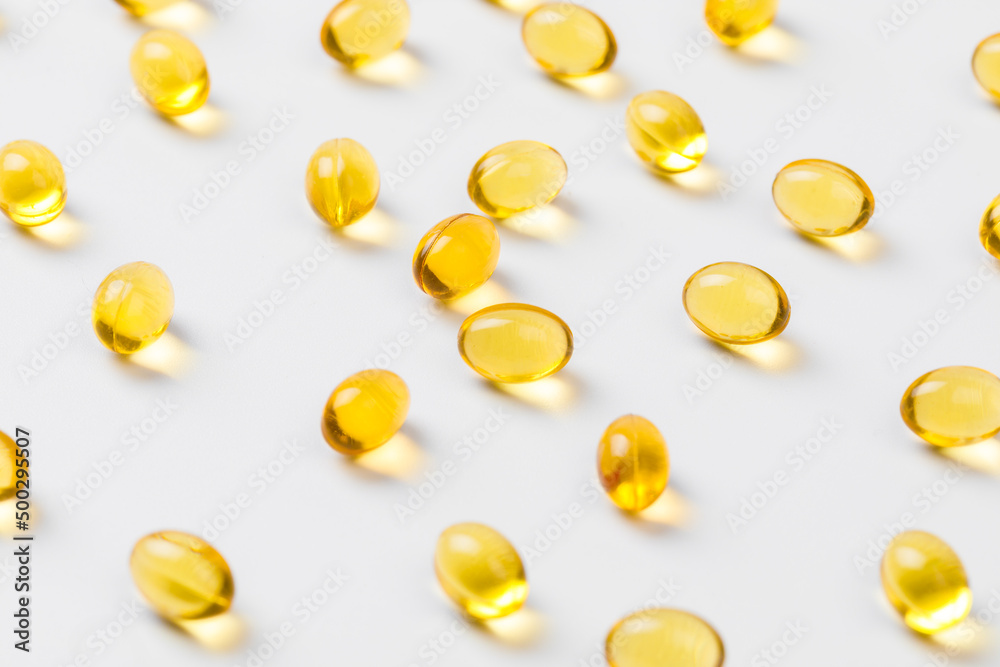 Close up of oil filled capsules suitable for: fish oil, omega 3, omega 6, omega 9, vitamin A, vitamin D, vitamin D3, vitamin E - Image Close up of oil filled capsules suitable for: fish oil, omega 3, omega 6, omega 9, vitamin A, vitamin D, vitamin D3, vitamin E - Image