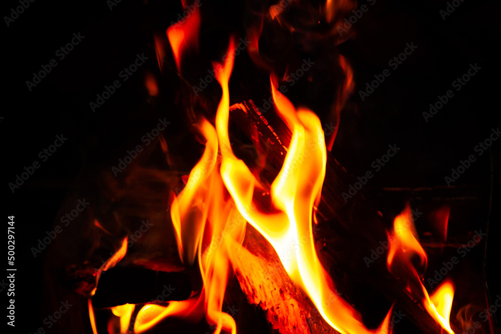 Mountain summer. Bonfire in night. Black background Mountain summer. Bonfire in night. Black background