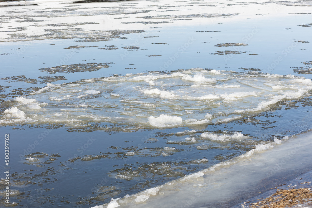 ice floes float on the river. Spring painting of the ice floe alloy. ice floes float on the river. Spring painting of the ice floe alloy.