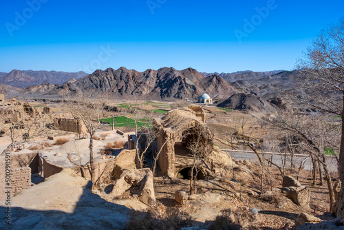Ruins of the adobe village of Kharanaq in Iran photo