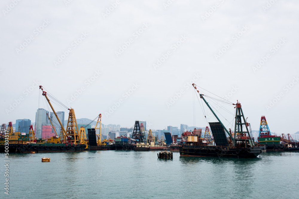 Construction ships moored in a Hong Kong port