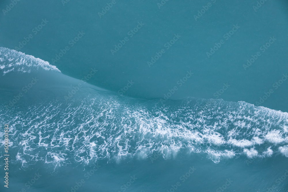 Waves in blue water