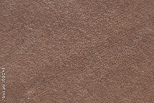 Soft brown fabric as a background macro photo, fabrics as an example for furniture