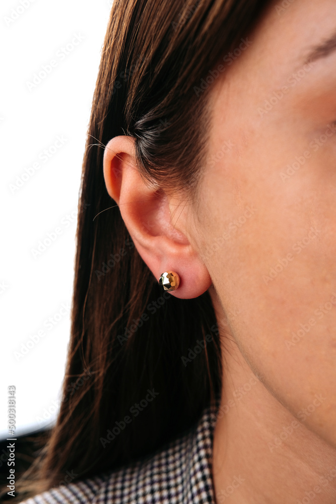 Beautiful girl. Fashion jewelry big earrings, dangle earrings and ball earrings for stylish and stylish woman. Fashion appearance, beauty and style. Natural makeup and easy styling Beautiful girl. Fashion jewelry big earrings, dangle earrings and ball earrings for stylish and stylish woman. Fashion appearance, beauty and style. Natural makeup and easy styling