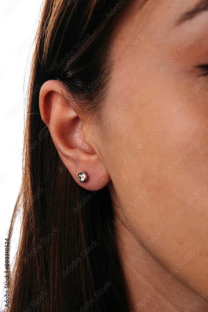 Beautiful girl. Fashion jewelry big earrings, dangle earrings and ball earrings for stylish and stylish woman. Fashion appearance, beauty and style. Natural makeup and easy styling Beautiful girl. Fashion jewelry big earrings, dangle earrings and ball earrings for stylish and stylish woman. Fashion appearance, beauty and style. Natural makeup and easy styling