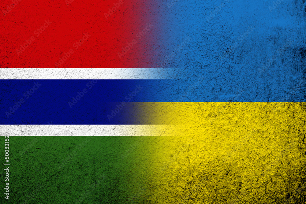 The Republic of The Gambia National flag with National flag of Ukraine. Grunge background
